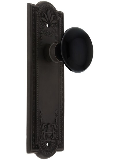 Meadows Plate with Black Porcelain Knob without Keyhole in Oil Rubbed Bronze with .